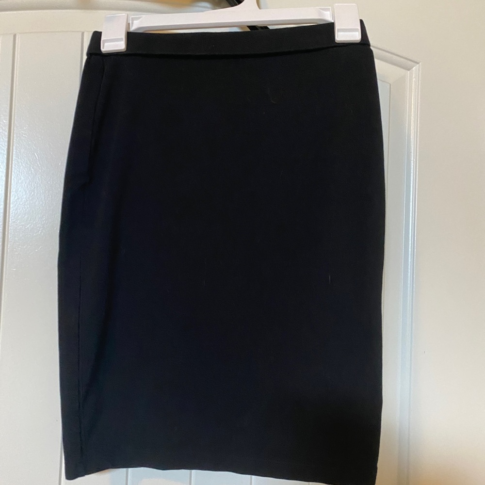 Black cotton pencil skirt.
